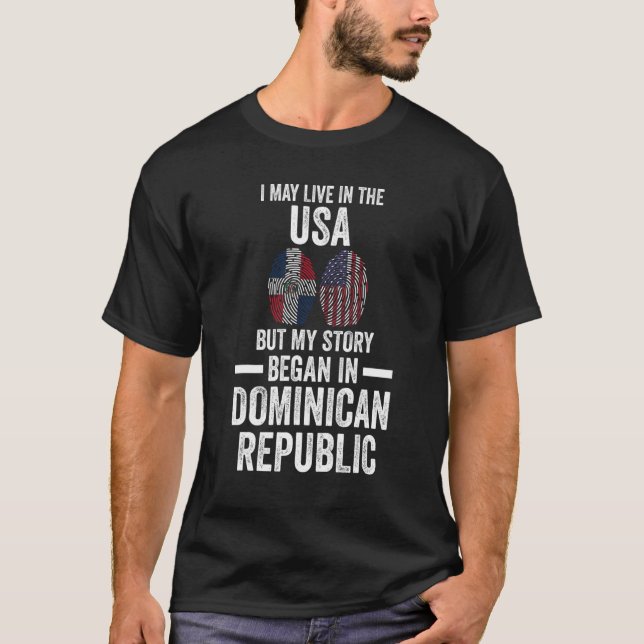 I may live USA but my story began great Dominican  T-Shirt (Front)