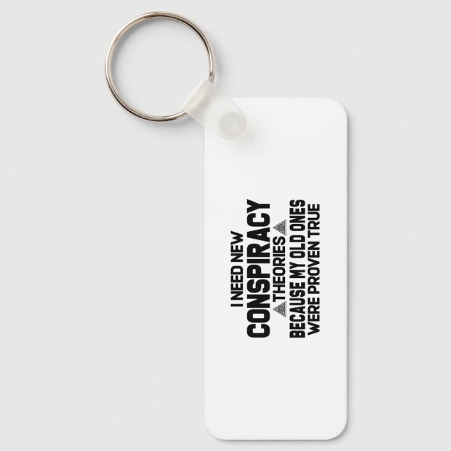 I need new conspiracy theories keychain (Front)