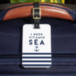 I Need Vitamin Sea Navy Anchor Quote Luggage Tag<br><div class="desc">Stand out at baggage claim with our summery nautical bag tag! Design features the quote "I Need Vitamin Sea" in navy blue lettering with an anchor illustration and a band of navy and white stripes. Add your contact information to the back, or choose the Business Card Slot option and slip...</div>