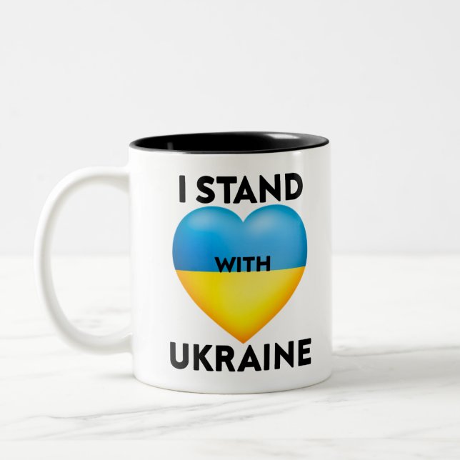 I Stand With Ukraine, We Support The Ukraine Two-Tone Coffee Mug (Left)