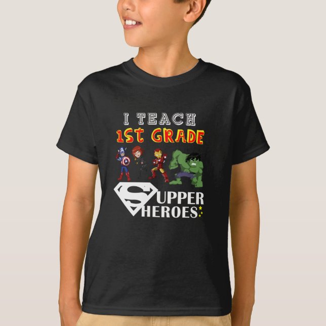 i teach 1st grade Superheroes T-Shirt (Front)