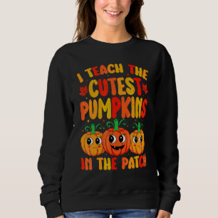 I Teach The Cutest Pumpkins Groovy Fall Autumn Hal Sweatshirt