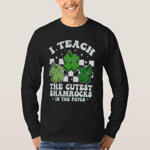 I Teach The Cutest Shamrocks Groovy Teacher St Pat T-Shirt