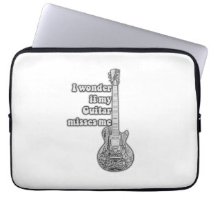 I wonder if my guitar misses me. Black and white Laptop Sleeve