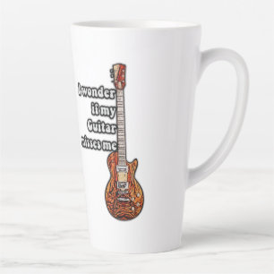 I wonder if my guitar misses me. vintage colours latte mug