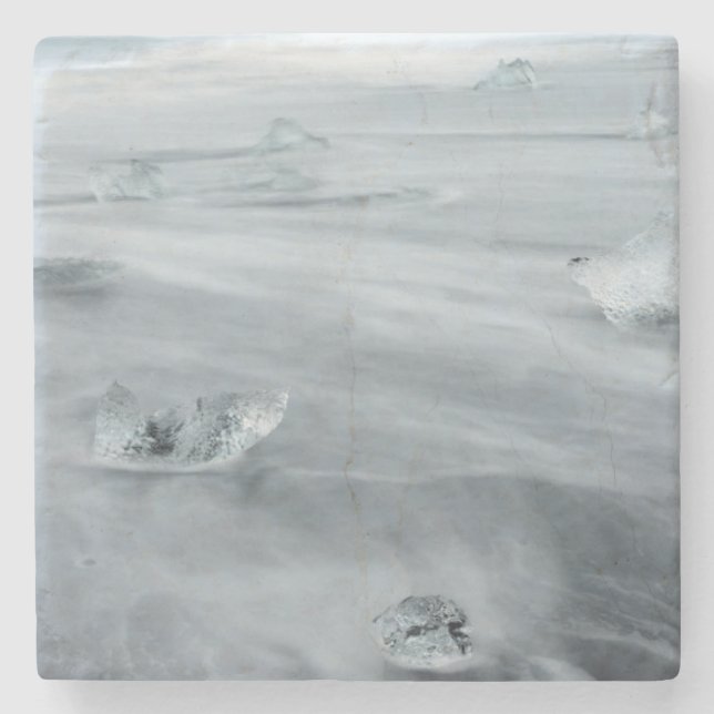 Ice and water on a beach, iceland stone coaster (Front)