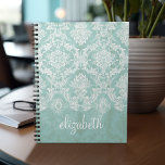 Ice Blue Vintage Damask Pattern with Grungy Finish Spiral Notebook<br><div class="desc">A vintage pattern with a chalkboard and lace design. Look closely to the flowers and leaves.A trendy design with jewel tone colors and elegance. Items are easier to customize when you replace all text and photos first. If your art still needs to be adjusted, click on the Customize This button....</div>