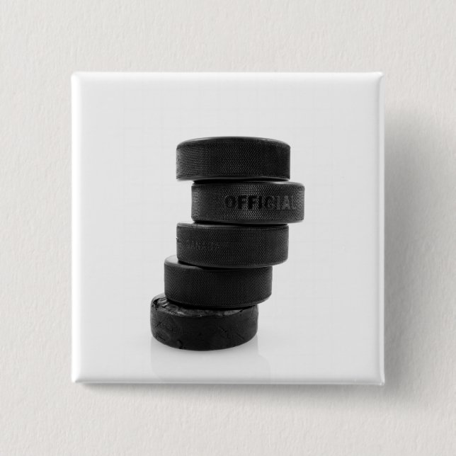 Ice hockey pucks... button (Front)