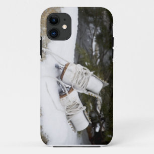 Ice skates, figure skates In snow iPhone 11 Case