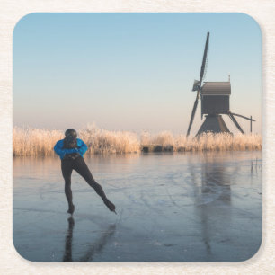Ice skating past windmill and reeds coaster