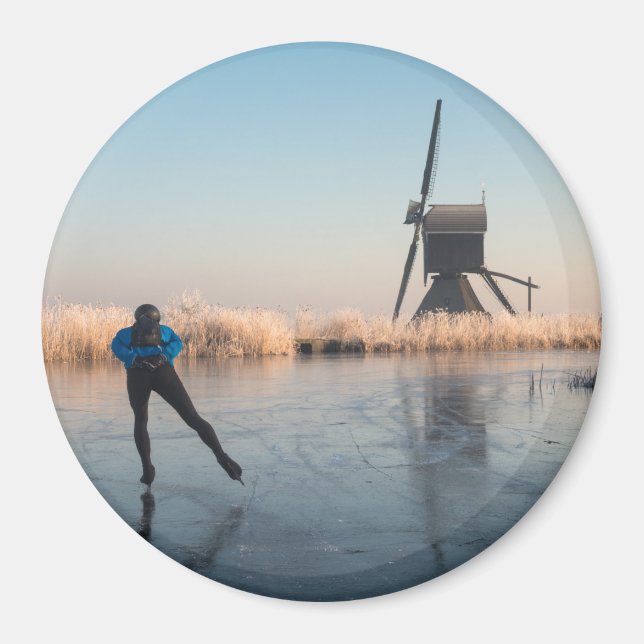 Ice skating past windmill & reeds round magnet (Front)