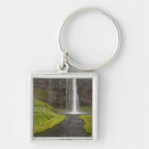 Iceland. People on trail behind Seljalandsfoss Key Ring