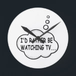 I'd Rather Be Watching TV Round Clock<br><div class="desc">I'd rather be watching tv. Cartoon speech bubble in black and white with funny quote.
A design for people that love watching tv.</div>