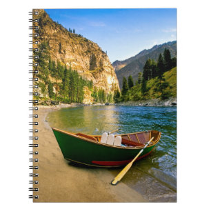 IDAHO, Fishing boat on a sandy beach in the Notebook