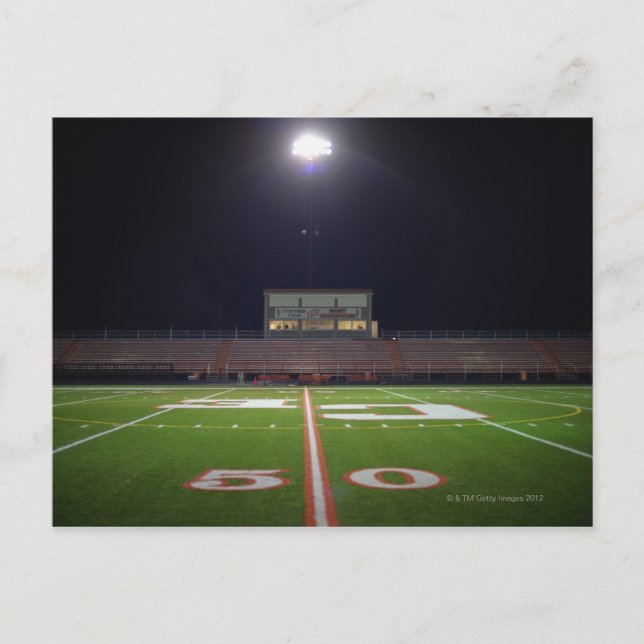 Illuminated American football field at night Postcard (Front)