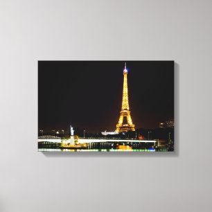 Illuminated Eiffel tower in Paris at night Canvas Print