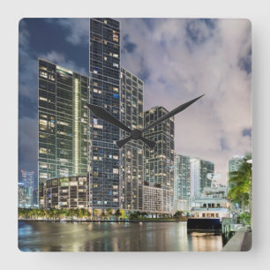 Illuminated towers at the Miami River waterfront Square Wall Clock