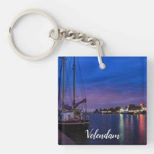 Illuminated Volendam harbor at night Key Ring