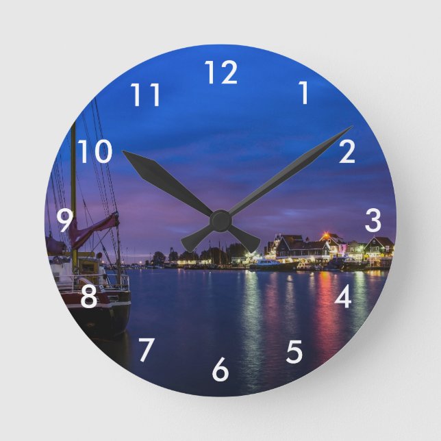Illuminated Volendam harbor at night Round Clock (Front)