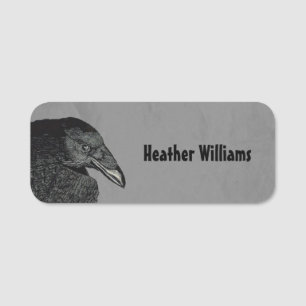Illustration of Head Wing of Black Crow on Grey Name Tag
