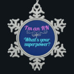I'm a RN Superhero Snowflake Pewter Christmas Ornament<br><div class="desc">I'm an RN,  what's your superpower? A funny registered nurse gift in blue with pretty teal and pink writing.</div>