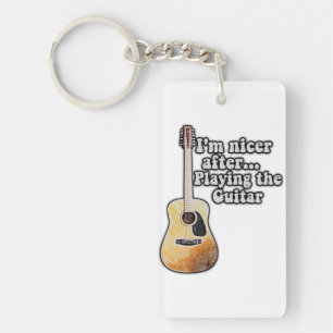 I'm nicer after playing the guitar. motivational key ring