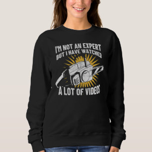 I'm not a expert funny woodworker chainsaw sawdust sweatshirt