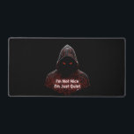 I'm Not Nice Desk Mat<br><div class="desc">Make a bold statement without saying a word. This design features a dark, hooded cyber assassin with glowing red circuit runes and the striking quote: "I'm Not Nice I'm Just Quiet." It’s a perfect mix of cyberpunk aesthetics and a gritty, introverted attitude. Designed for those who appreciate minimalist techwear, dark...</div>