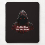 I'm Not Nice Mouse Pad<br><div class="desc">Make a bold statement without saying a word. This design features a dark, hooded cyber assassin with glowing red circuit runes and the striking quote: "I'm Not Nice I'm Just Quiet." It’s a perfect mix of cyberpunk aesthetics and a gritty, introverted attitude. Designed for those who appreciate minimalist techwear, dark...</div>