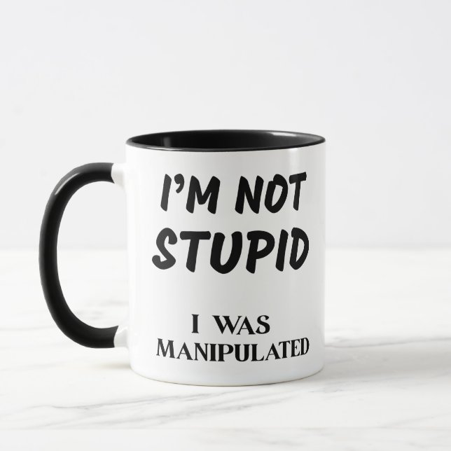 I'M NOT SUPID, I WAS MANIPULATED MUG (Left)