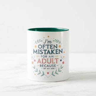I'm often mistaken for an adult because of my age Two-Tone coffee mug