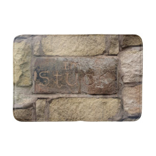 "I'm Stuck" another brick in the wall Bath Mat