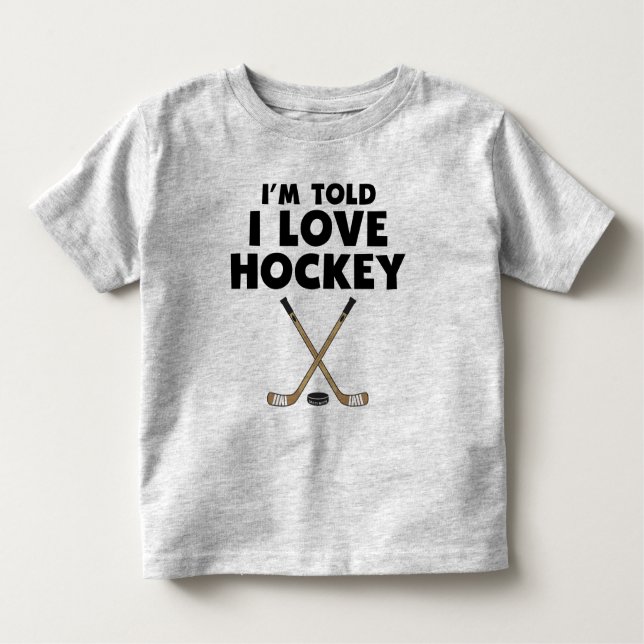 I'm Told I Love Hockey Toddler T-Shirt (Front)