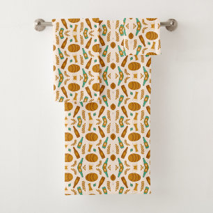 Image features a set of towels and a washcloth