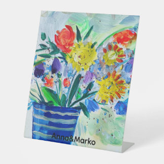 Impressionist-style vase of flowers pedestal sign