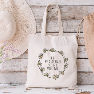 In a Field of Roses, She is a Wildflower Tote Bag