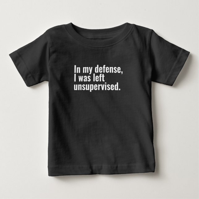 In my defence, I was left unsupervised funny text Baby T-Shirt (Front)