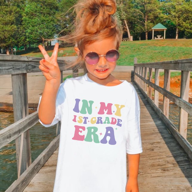 In my First Grade era kid T-Shirt (Creator Uploaded)