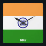 India Flag Dazzling Patriotic Square Wall Clock<br><div class="desc">India Flag Dazzling Patriotic Square Wall Clock in the colours and the elements of the India national flag covering the front of the clock. National flag colours are complemented with the text "India" on the bottom. Text is fully customisable using "Customise it!" feature. Feel free to change it, remove it...</div>