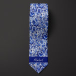 Indigo Floral Monogram Tie<br><div class="desc">Make a stylish statement with our Indigo Floral Monogram Neck Tie. The indigo hue and floral monogram design add a touch of sophistication to your wedding attire. Don't forget to explore our matching socks to complete your look.</div>