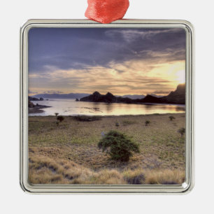Indonesia, Komodo National Park. Sunset on one Metal Tree Decoration