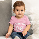 Infant Girl Name Jersey Number Sports Soft Cotton Baby T-Shirt<br><div class="desc">Create your own custom, personalised, cool, unisex sizing, modern, stylish white typography / font / script, monogrammed player name jersey number classy girly baby pink, 100% combed ring spun fine jersey soft cotton t-shirt tee shirt. Simply type in your name / kids name / player name and player jersey number,...</div>