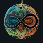 Infinity Mandala  African Tribal Mask  Abstract  Ceramic Tree Decoration<br><div class="desc">Infinity Mandala African Tribal Mask Abstract Ornament Infuse your home with vibrant energy through our Infinity Mandala Tribal Mask Abstract This stunning design features a black infinity symbol at its heart, surrounded by bold geometric patterns in marine blue, lime green, dark leaf green, burnt orange, and russet red. The mandala-inspired...</div>