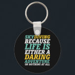 Inspirational Skydiving Life Is A Daring Adventure Key Ring<br><div class="desc">Life's a daring adventure or nothing at all. Inspirational and motivational life quote design for those who love skydiving, parachuting, jumping from aeroplane and glide in the sky. Cool and awesome merchandise for skydiver and extreme sports lover. Perfect for those who love this recreational outdoor activity, freefalling from the sky....</div>