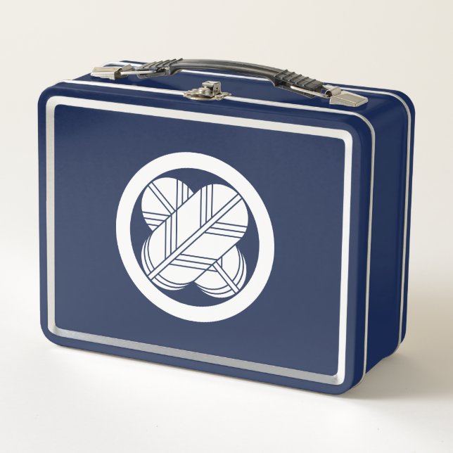 Intersecting hawk feathers in circle metal lunch box (Front)