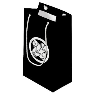 Intersecting hawk feathers in circle small gift bag