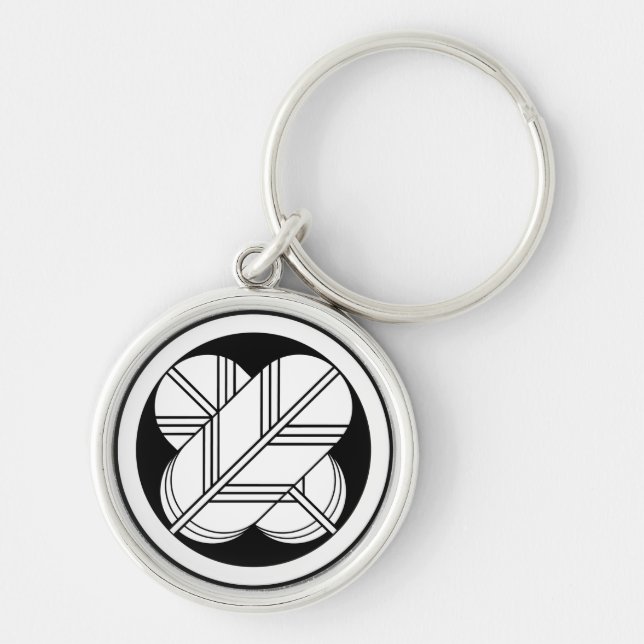 Intersecting hawk feathers with foot in circle key ring (Front)