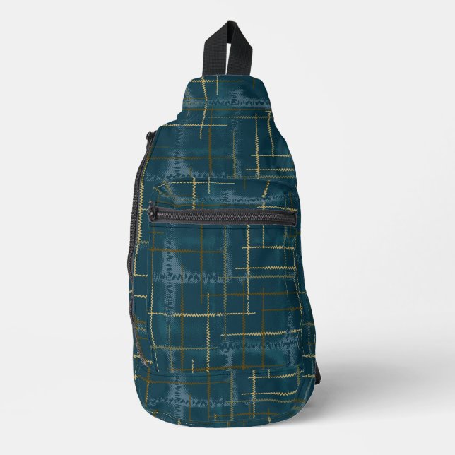 Intersecting lines and shapes creates a textured sling bag (Front)