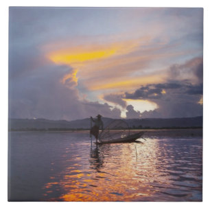 Intha fisherman leg rowing boat fishing with net tile