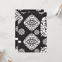 Intricate black and white pattern featuring floral